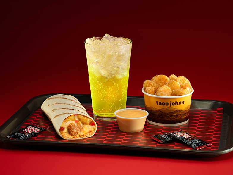 Picture of a Western Gold Grilled Burrito, Potato Olés®, and a fountain drink
